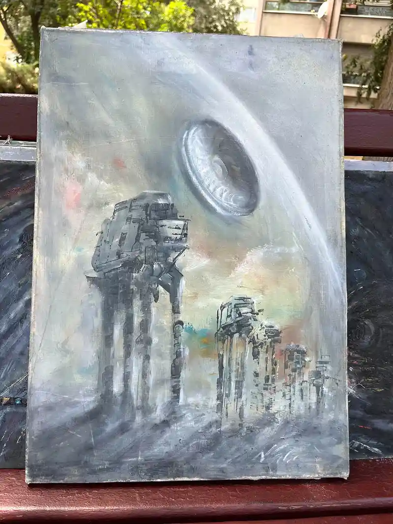 A hand-painted canvas depicts a gray, abstract scene with two large, blocky, mechanical figures resembling Star Wars AT-AT…