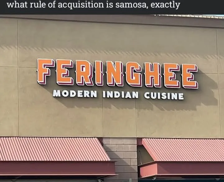 A photo of a restaurant sign reading 'FERINGHEE MODERN INDIAN CUISINE' with a black bar at the top containing the text 'what…