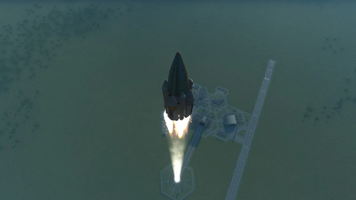 An aerial view of a rocket launching from a coastal launchpad, with bright flames and smoke billowing from its engines. The…