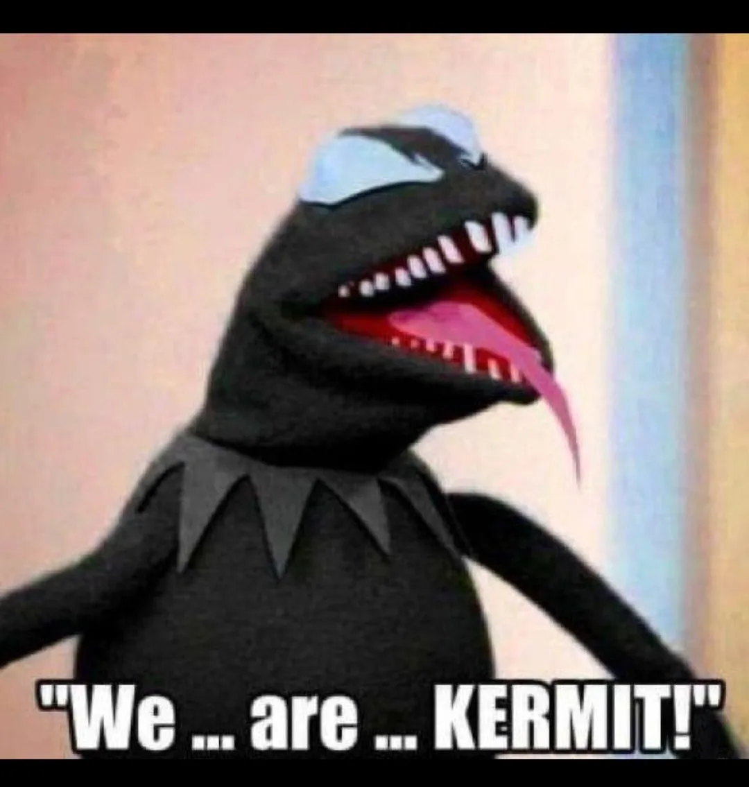 A digitally altered image of the Muppet character Kermit the Frog, modified to have a black, Venom-like symbiote body with…