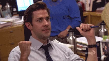 A six-panel image sequence shows a man in a white shirt and tie sitting at a desk, holding a pen in one hand and a clenched…