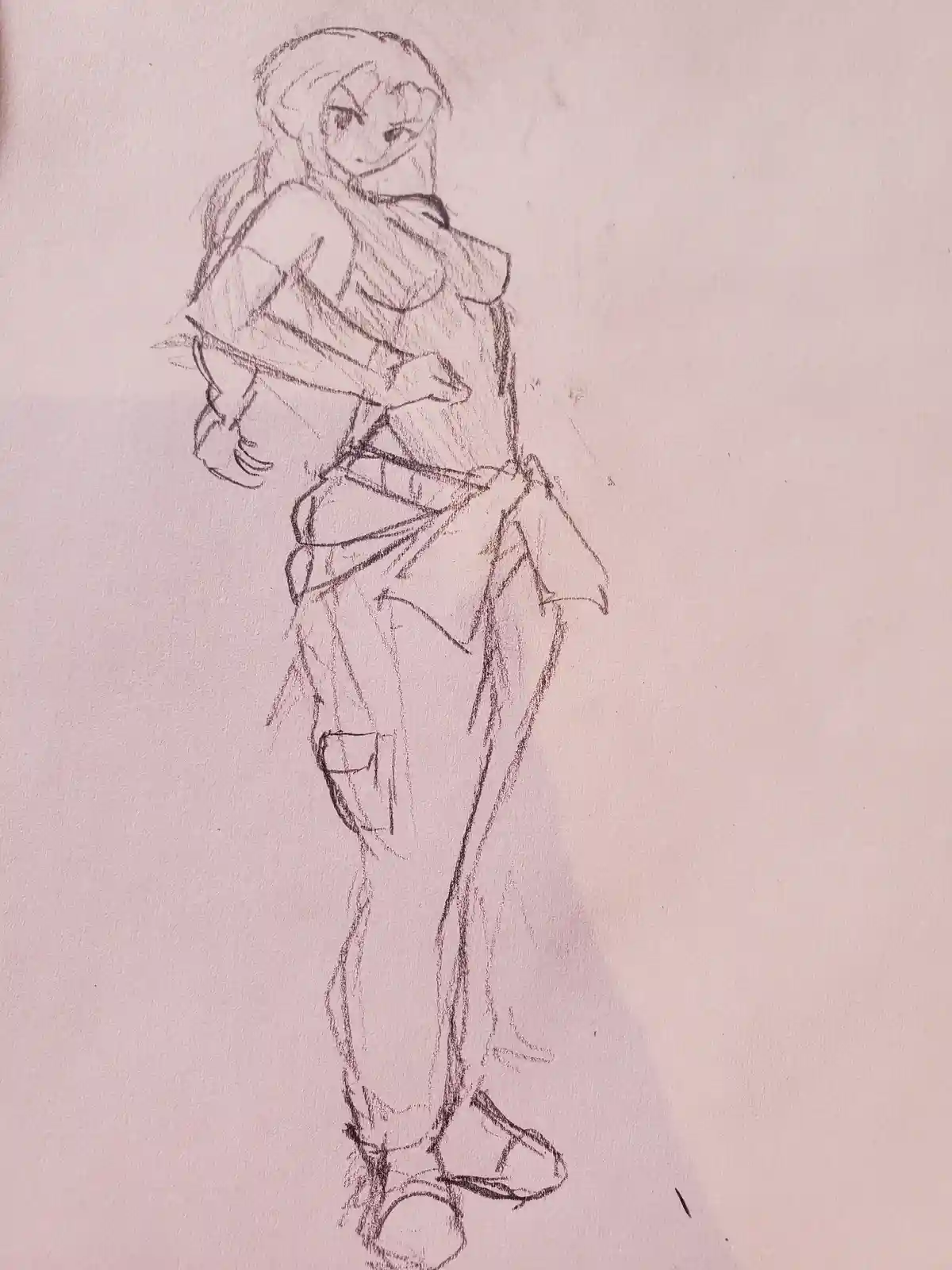 A rough pencil sketch of an anime-style female character standing with arms crossed, wearing a top, pants, and boots. The…