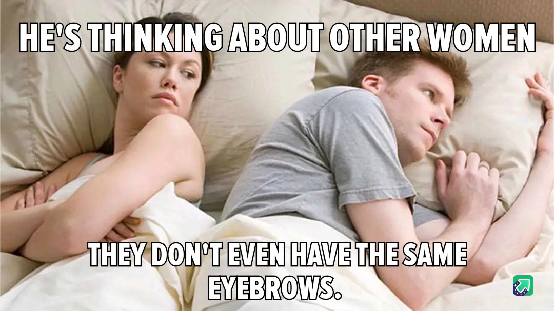 A man and woman lie in bed, facing away from each other. The woman looks upset with arms crossed, while the man looks away…