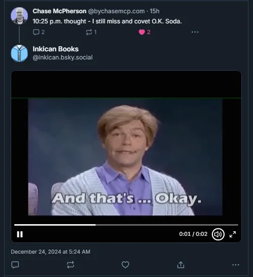 A screenshot of a tweet showing a short video clip of a man with light brown hair wearing a purple shirt and white knit…