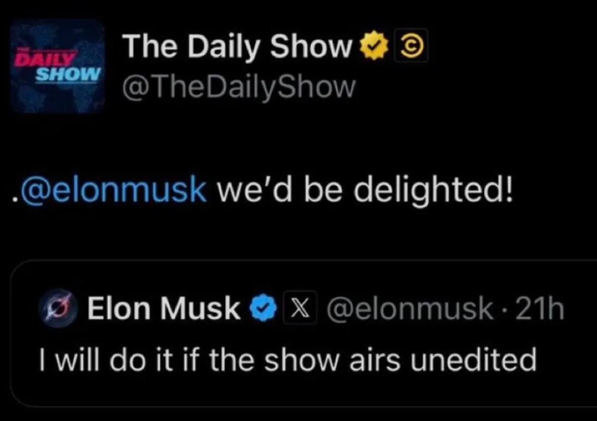 A screenshot of a Twitter thread shows The Daily Show's official account replying to Elon Musk with 'we'd be delighted!'…