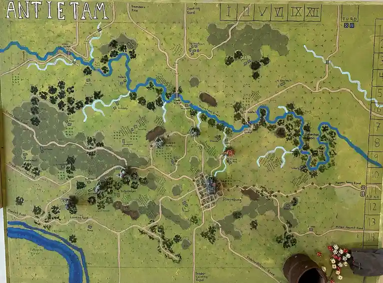 A hand-drawn wargaming map of the Antietam battlefield with terrain, roads, and labeled locations like Sharpsburg and…