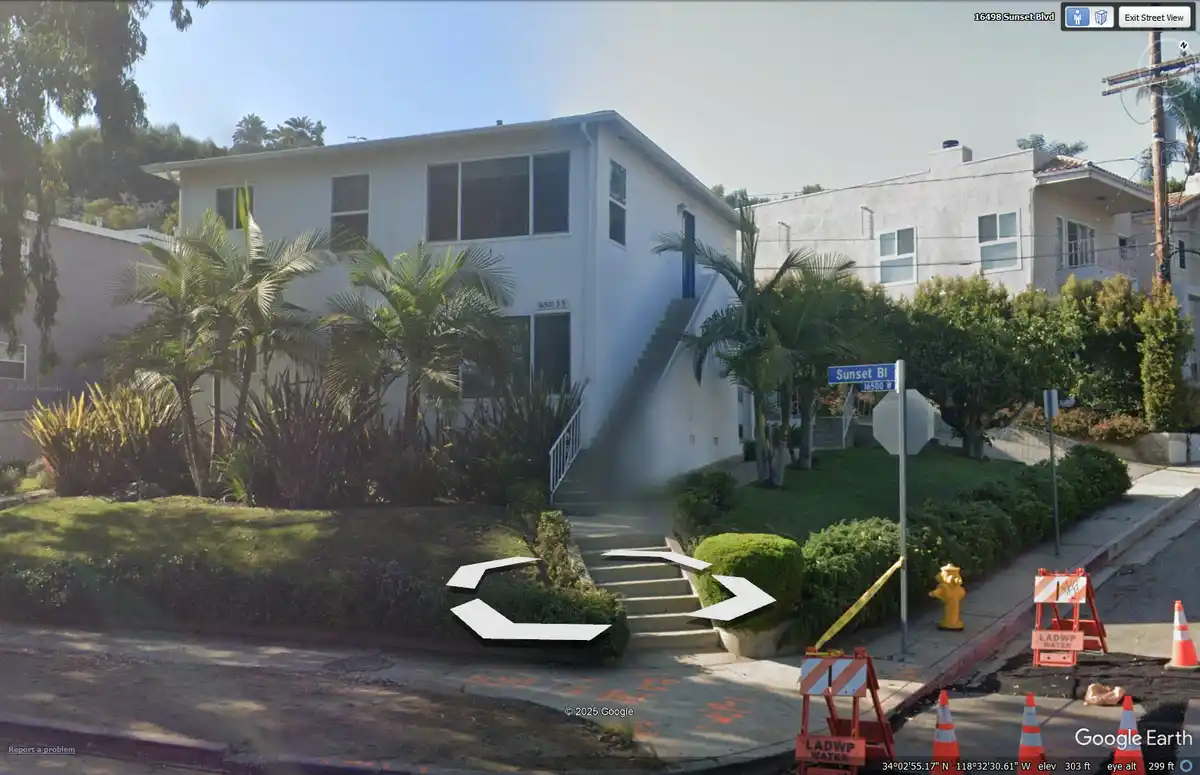 this is a google street view image of a house on sunset blvd with a large white arrow pointing to the stairs leading up to…