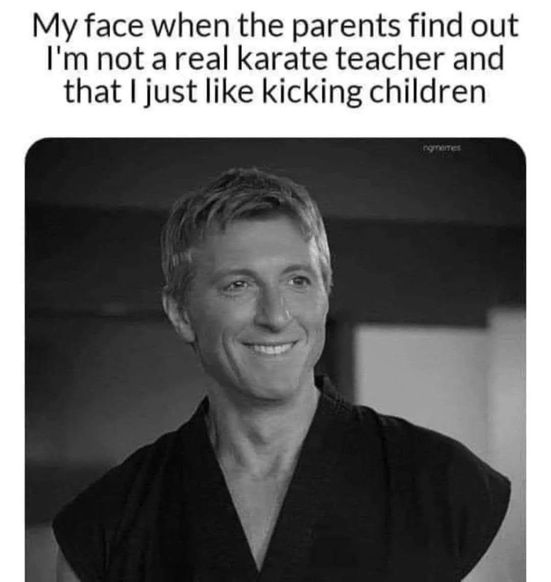 A black and white photo of a man in a karate gi smiling confidently. The overlaid text reads: 'My face when the parents find…