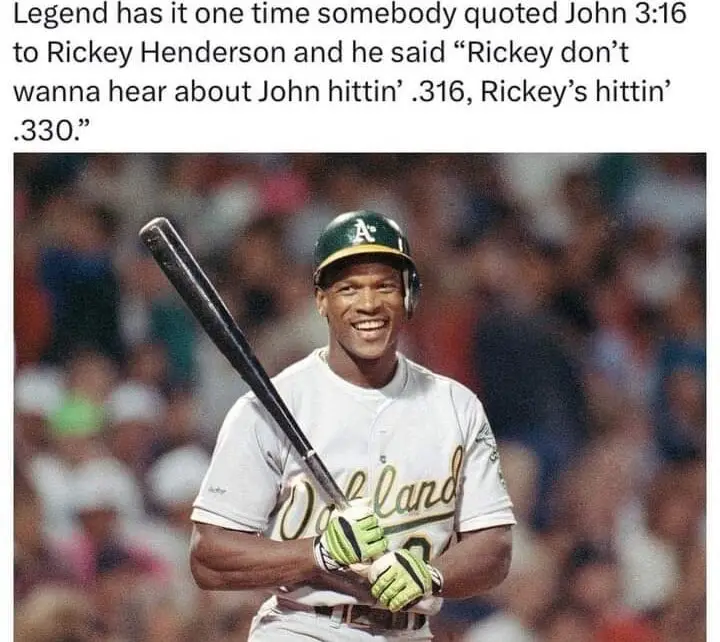 A smiling baseball player in an Oakland Athletics uniform holds a bat, with a crowd blurred in the background. The overlaid…