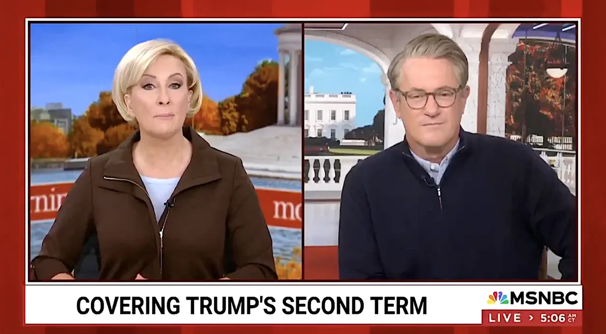A split-screen MSNBC news broadcast shows two anchors, a woman on the left and a man on the right, both with serious…