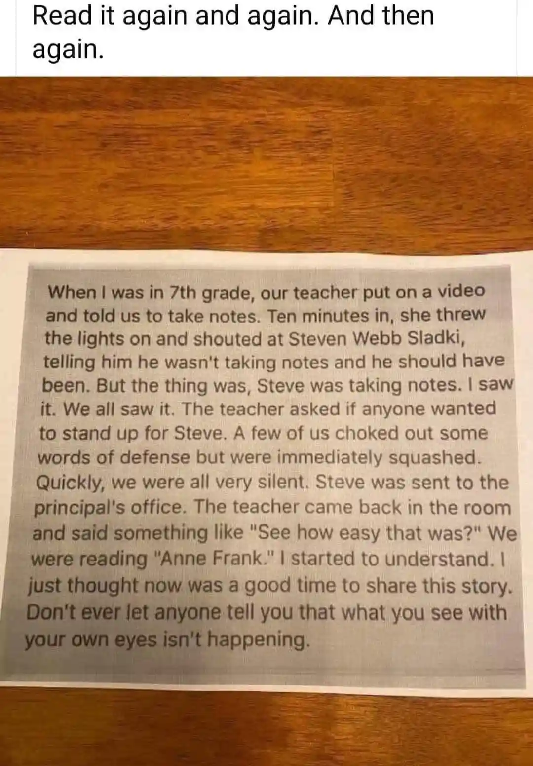 A printed text is shown on a wooden surface, recounting a 7th-grade classroom incident where a teacher wrongly accused a…