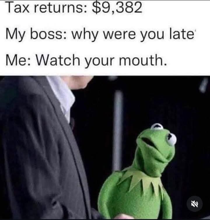 The image shows Kermit the Frog looking up with a stern, slightly annoyed expression while standing next to a man in a suit…