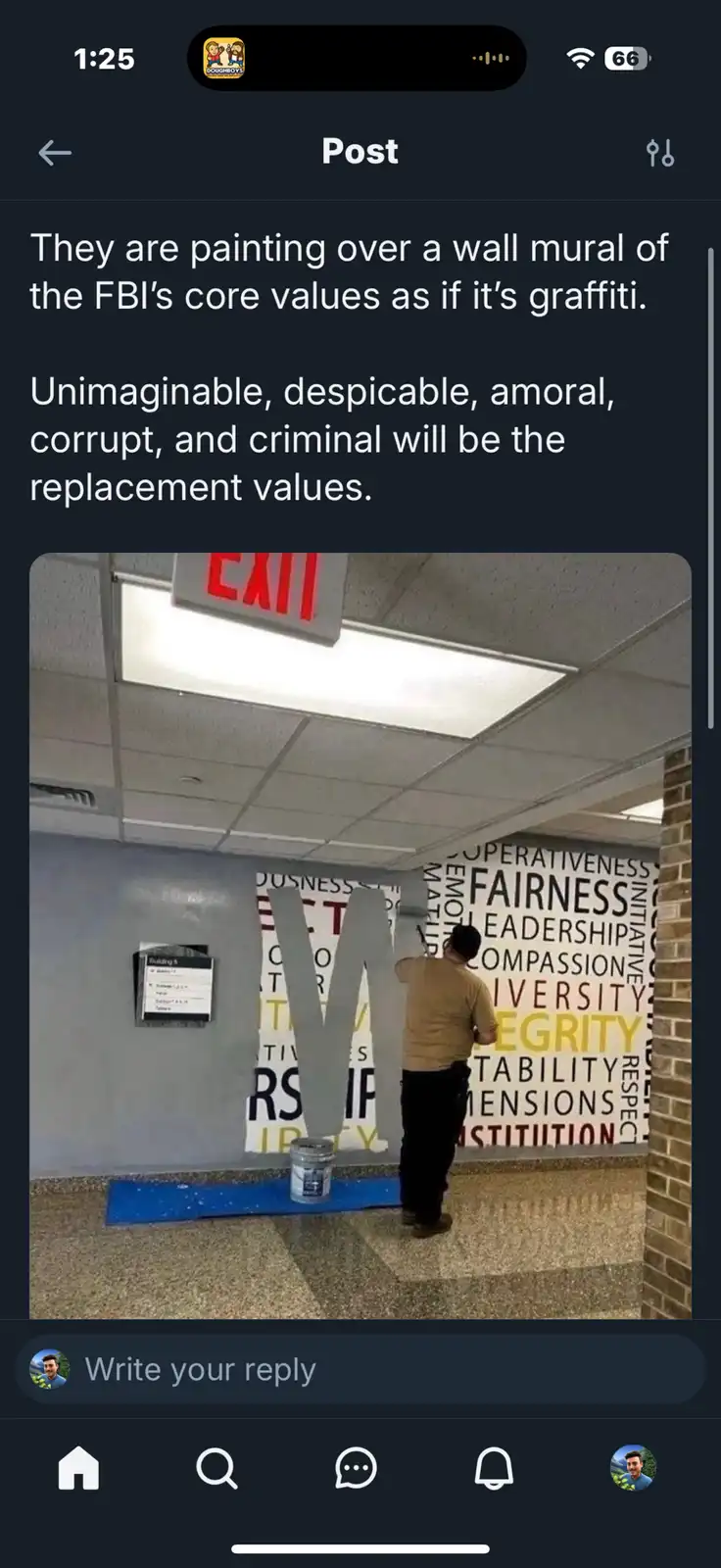 A person is painting over a wall mural with words like 'fairness,' 'integrity,' and 'respect' in an office hallway, as if…