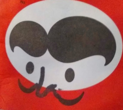 A cartoonish white oval face with two large black eyebrows shaped like mustaches, two small black eyes, and a small black…