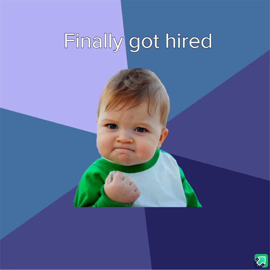 A baby with a green and white shirt, making a determined, slightly smug face with a clenched fist, set against a geometric…