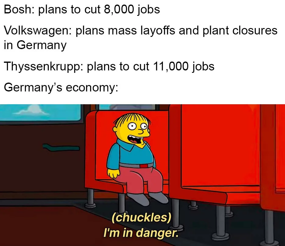The image shows a cartoon character from The Simpsons, Milhouse, sitting on a red bus seat with a nervous, wide-eyed…
