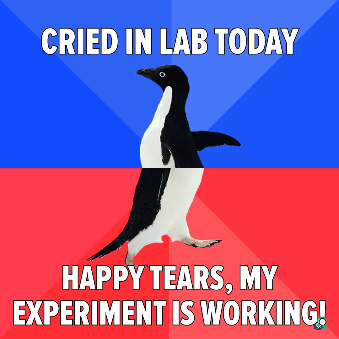 A penguin stands centered against a blue and red background, with bold white text at the top reading 'CRIED IN LAB TODAY'…