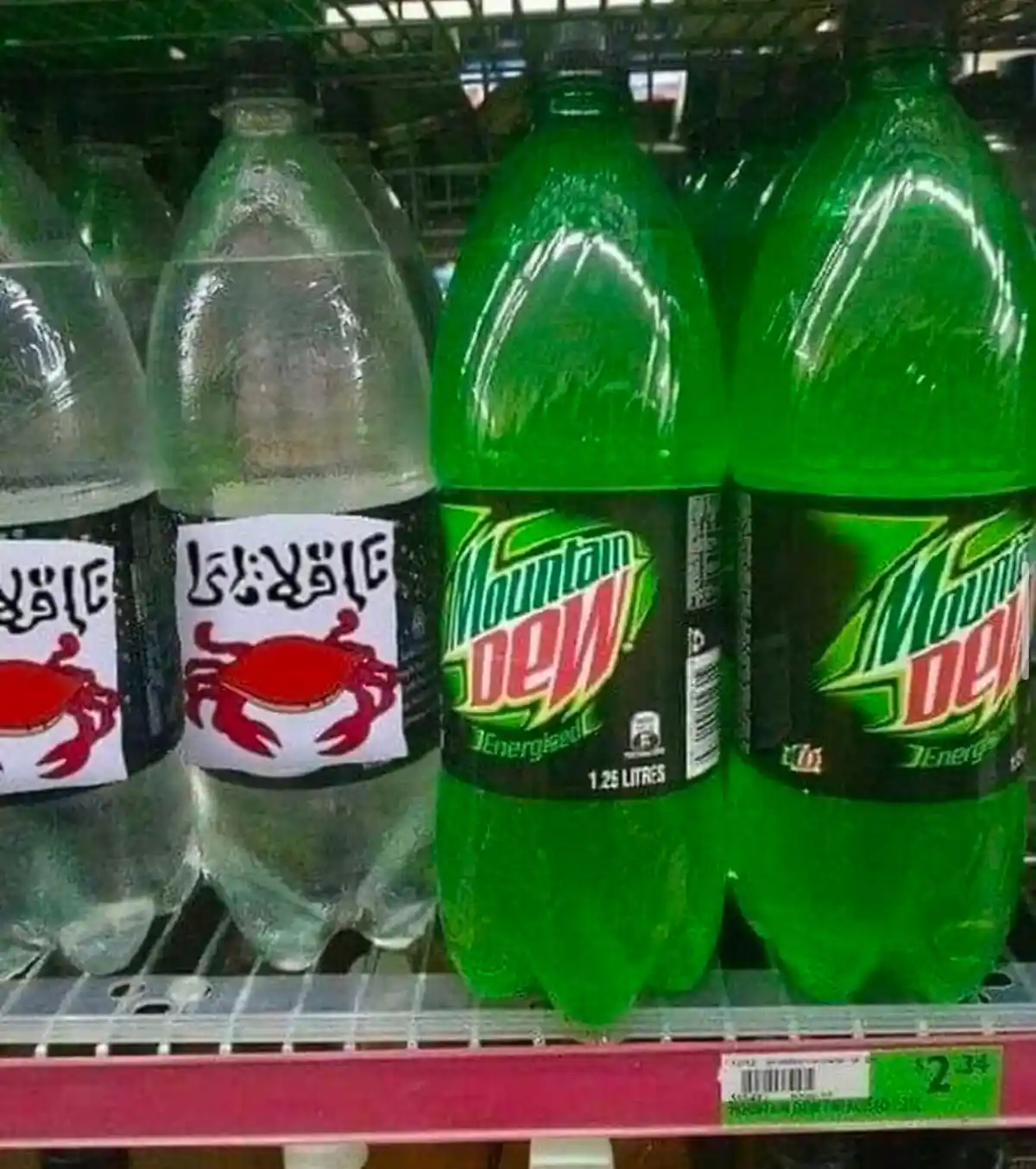 A supermarket shelf displays green Mountain Dew bottles next to clear plastic bottles with custom labels featuring red crab…