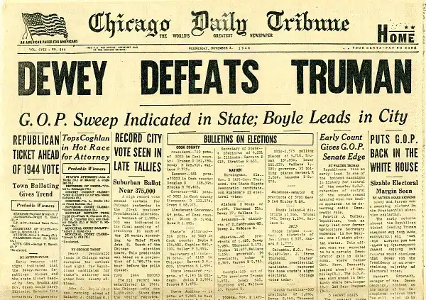 A black-and-white image of the Chicago Daily Tribune front page from November 2, 1948, with large headline 'DEWEY DEFEATS…