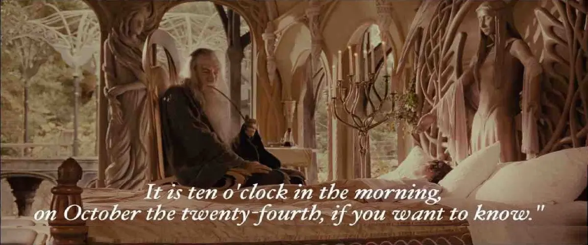 A still from 'The Lord of the Rings' shows Gandalf sitting on a bed in a grand, ornate room with carved statues and arched…