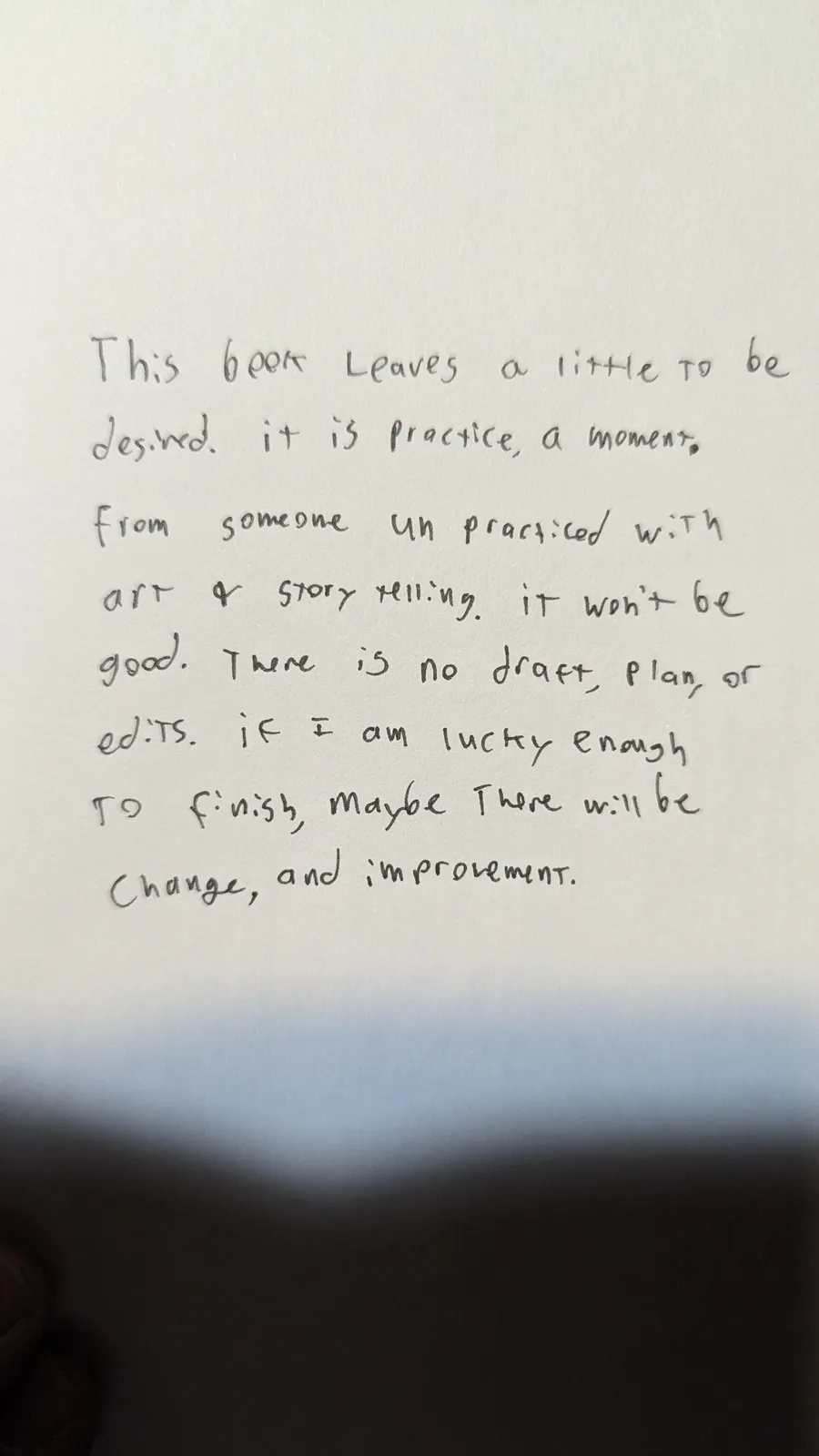A close-up photo of handwritten text on white paper, written in black ink with some misspellings and informal punctuation…