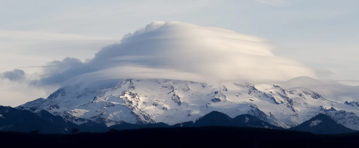 A Mysterious Cloud Veil Drapes Over Mt. Rainier