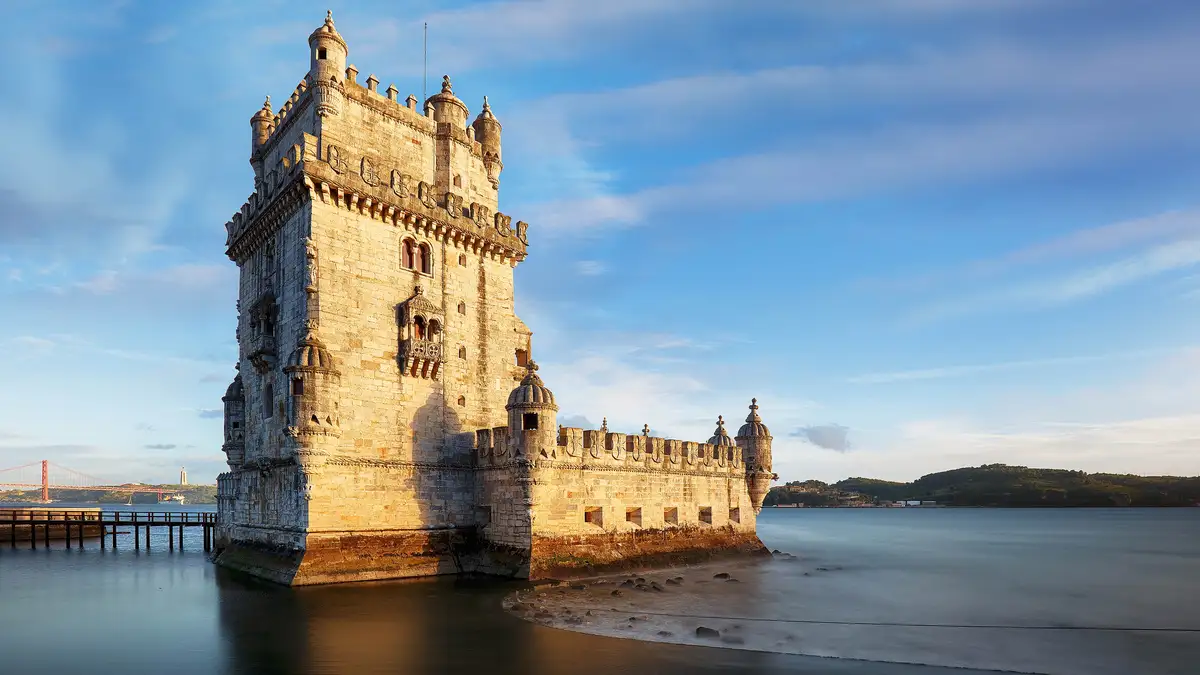 In Portugal, modern tranquility belies its former status as a powerful empire. The Manueline architectural style, seen in…