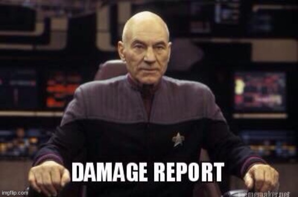 A still image of Captain Picard from Star Trek: The Next Generation, seated at his command chair in the bridge, looking…