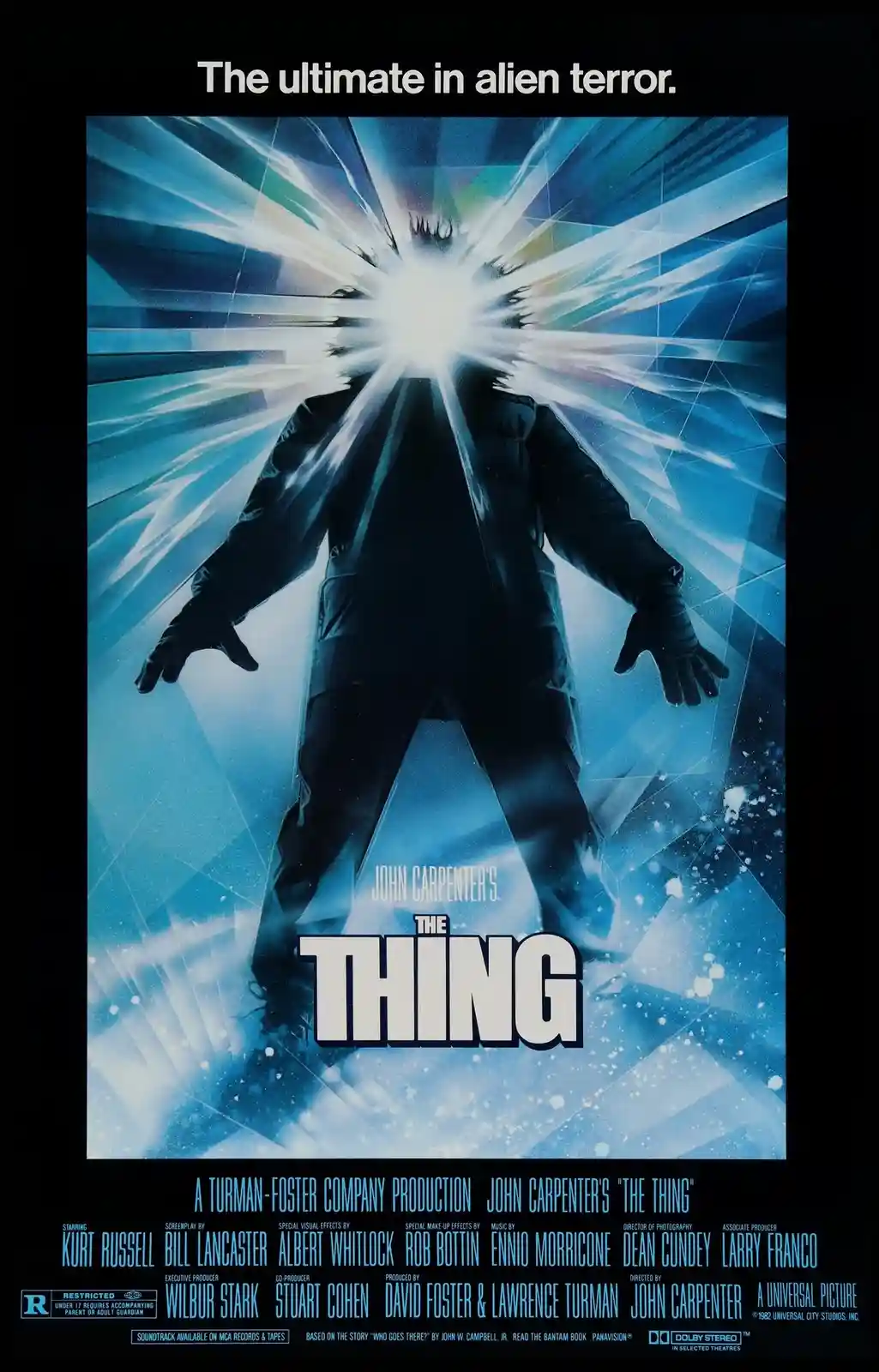 A movie poster for John Carpenter's 'The Thing' shows a silhouetted figure in a dark suit with arms outstretched, surrounded…