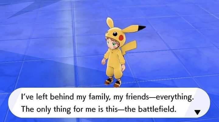A young anime-style character wearing a full-body Pikachu costume stands on a blue tiled floor. A speech bubble below them…