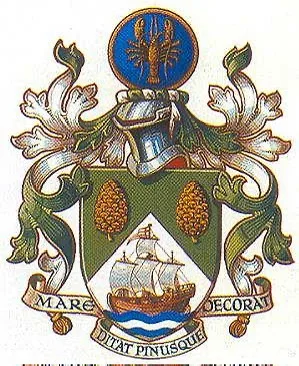 A heraldic coat of arms featuring a green shield with a ship on blue waves, flanked by pinecones, topped by a blue circular…