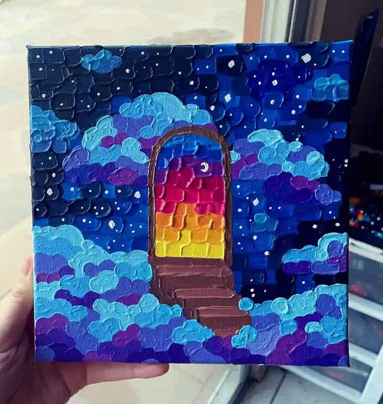 A hand holds a textured, thickly painted canvas depicting a brown arched doorway with steps, set against a night sky of deep…