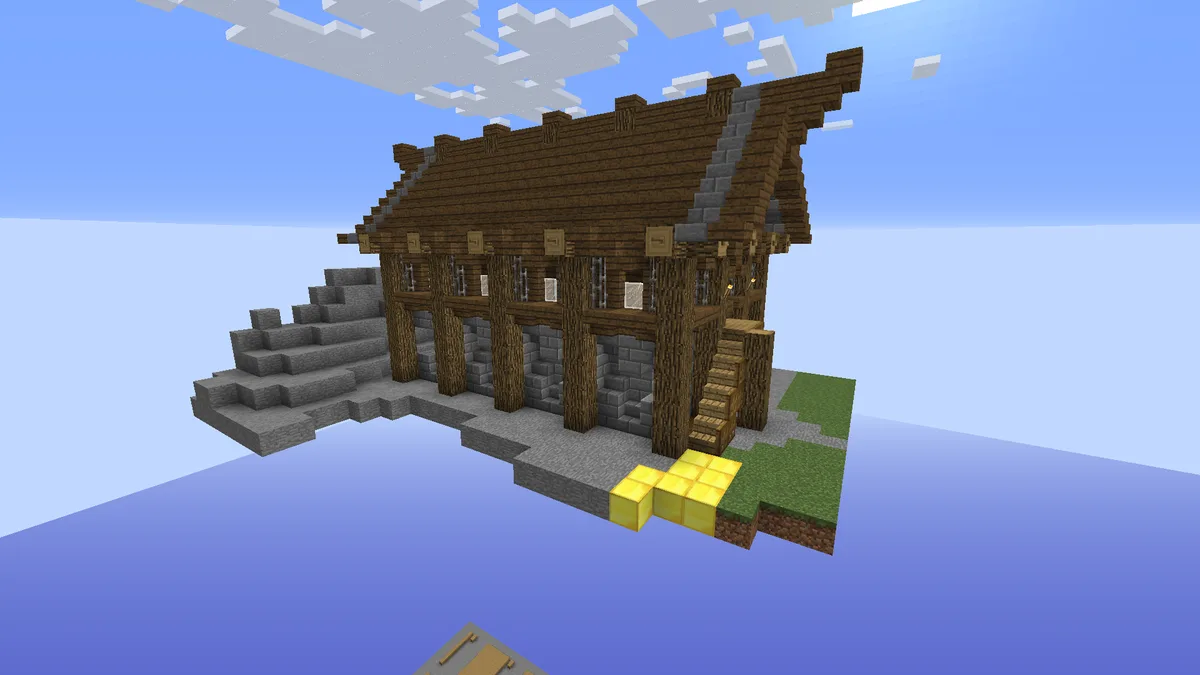 A Minecraft house made of wood and stone blocks, built on a floating platform with stairs leading up to it, set against a…