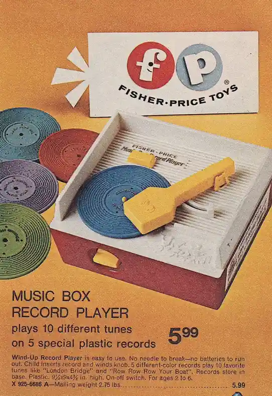 A vintage Fisher-Price advertisement shows a plastic wind-up record player with a yellow tonearm and a blue record on its…