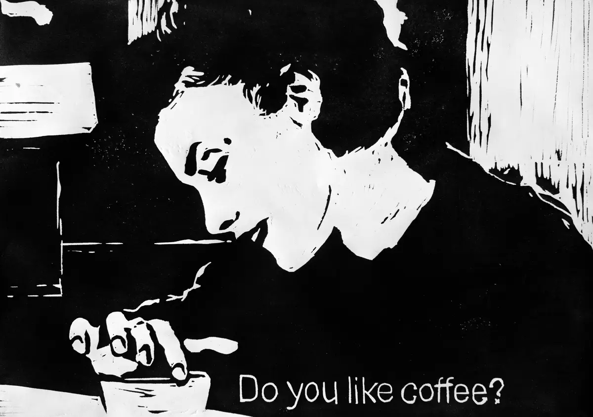 A black-and-white stylized illustration shows a person in profile, leaning forward with their hand resting on a coffee cup…
