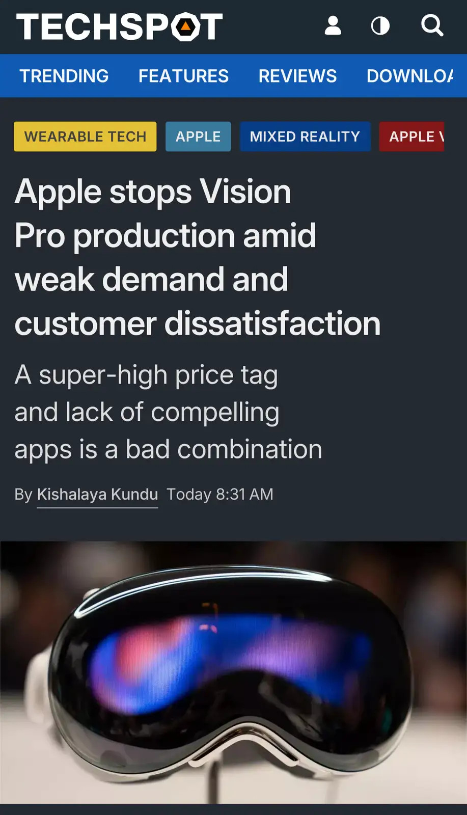 A TechSpot news article screenshot shows a headline about Apple halting Vision Pro production due to weak demand and…