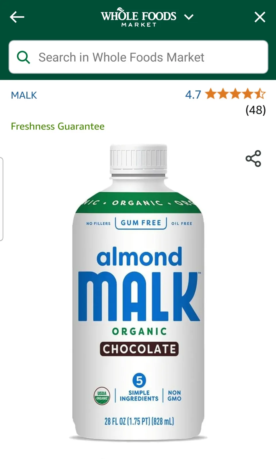 A screenshot of a Whole Foods Market product page showing a bottle of almond milk with the word 'MALK' misspelled as 'MALK'…