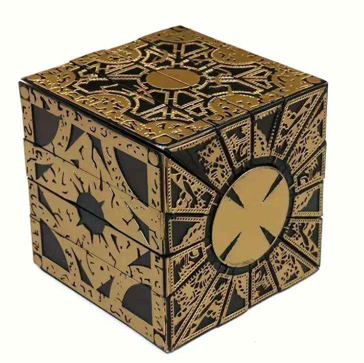 A highly detailed, ornate cube with gold and black filigree patterns, featuring a prominent circular emblem on one face and…