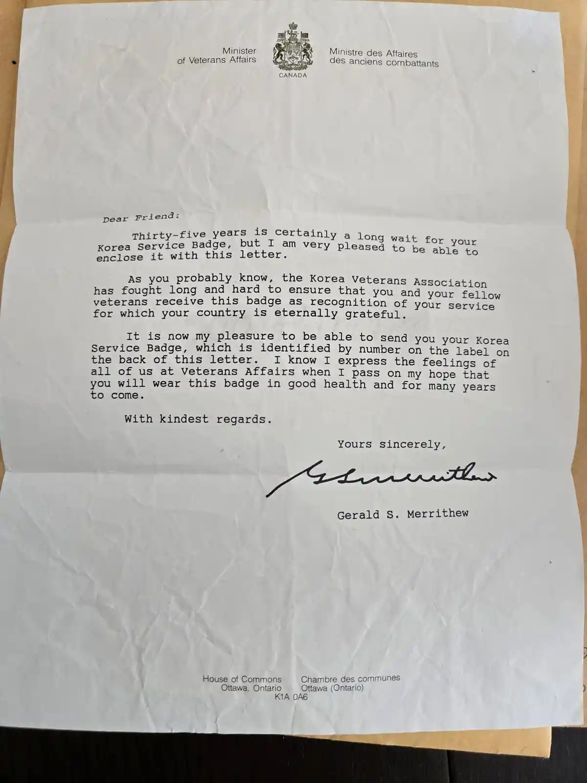 A crumpled official letter from the Minister of Veterans Affairs, Canada, addressed to a veteran, apologizing for the…