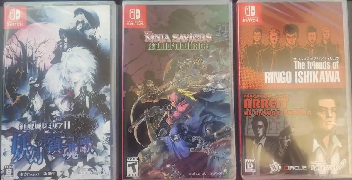 Three Nintendo Switch game cases are displayed side-by-side. The left case shows '紅魔城レミリアⅡ 妖幻の鎮魂歌' (Remilia Scarlet II: The…