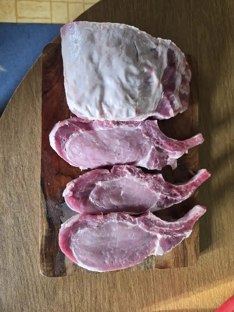 Expertly Butchering a Pork Roast: From Standing Rib to Delicious Ribeyes