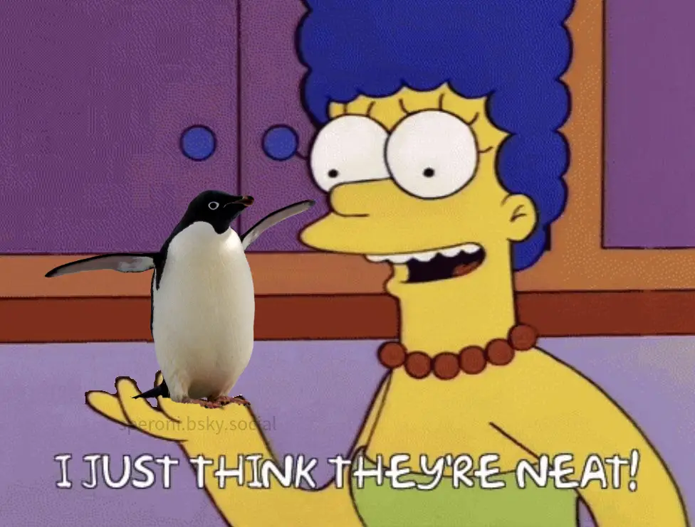 A still image from The Simpsons shows Marge Simpson with wide eyes and an open mouth, holding a penguin on her hand. The…