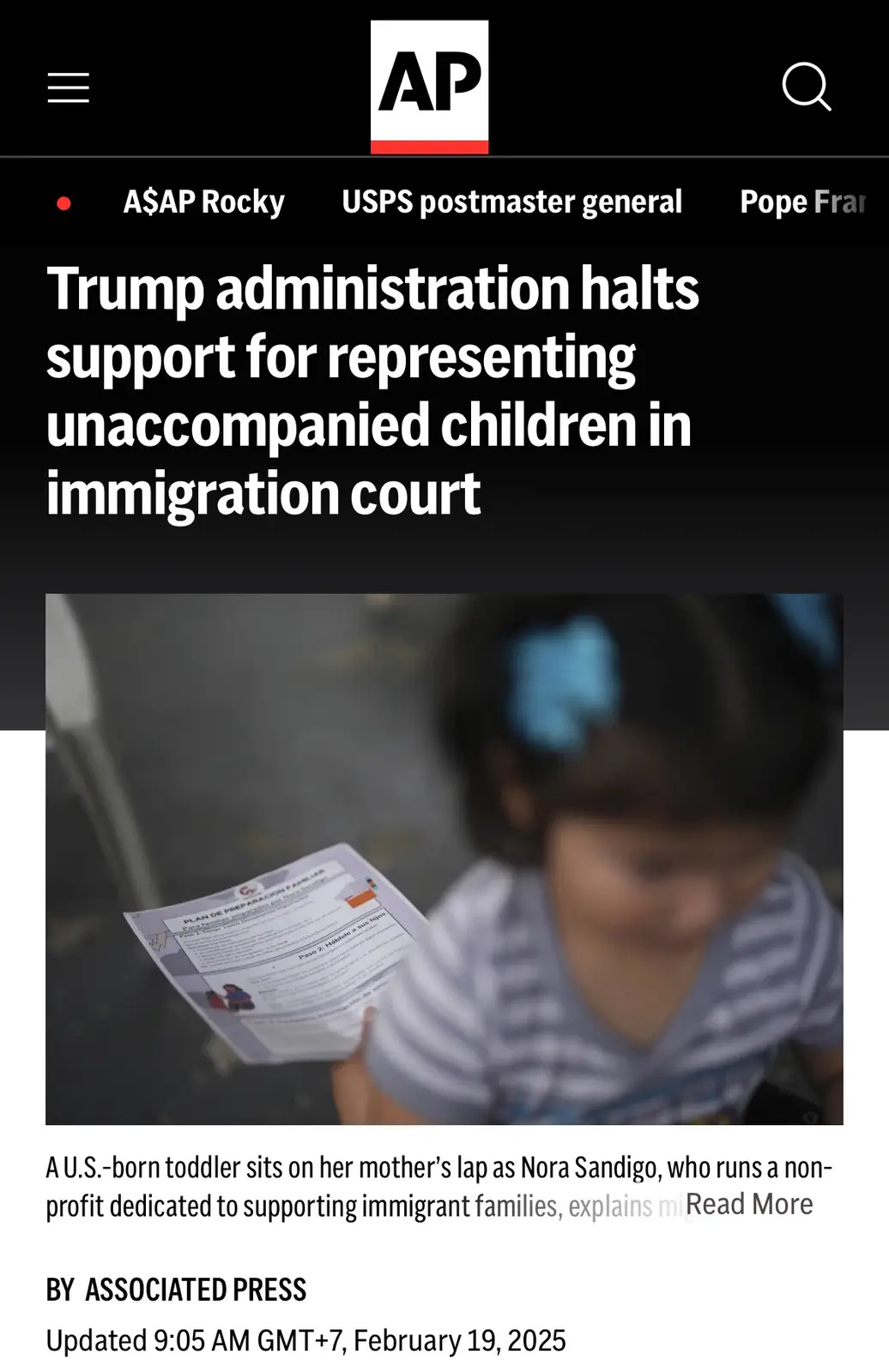 A screenshot of an Associated Press news article shows a blurred photo of a young child holding a document, with the…