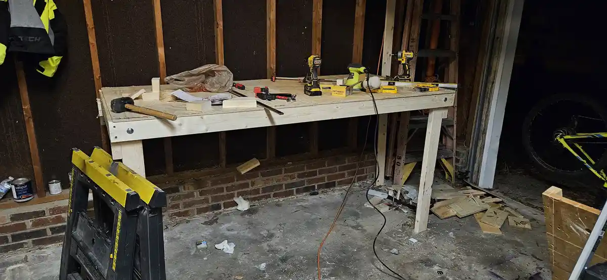 Innovative Wall-Mounted Folding Workbench for Small Spaces