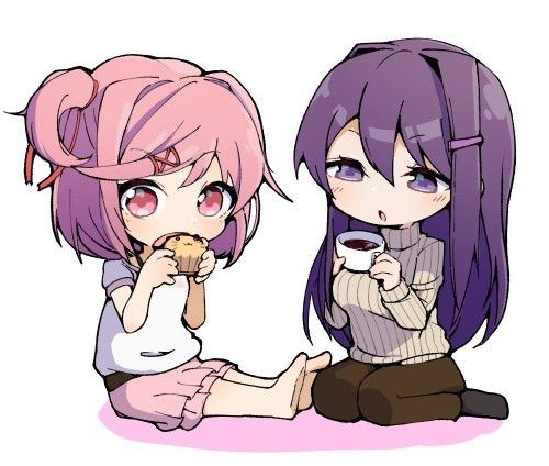 Two anime-style girls sit on the floor; the pink-haired girl enthusiastically eats a cookie while the purple-haired girl…