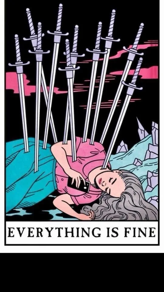 An illustrated tarot card depicts a woman with long grey hair lying on her back, seemingly unconscious or dead, while…