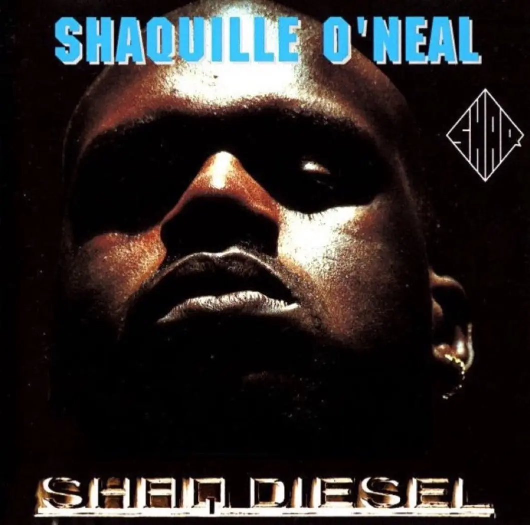 The image is a parody of Shaquille O'Neal's 1996 album cover, featuring a close-up of his face with dramatic lighting. The…