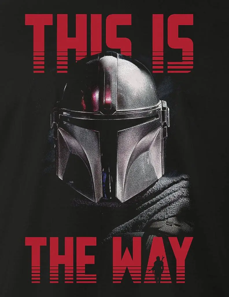 A black t-shirt graphic featuring a close-up of the Mandalorian's iconic silver helmet, with red block text above and below…
