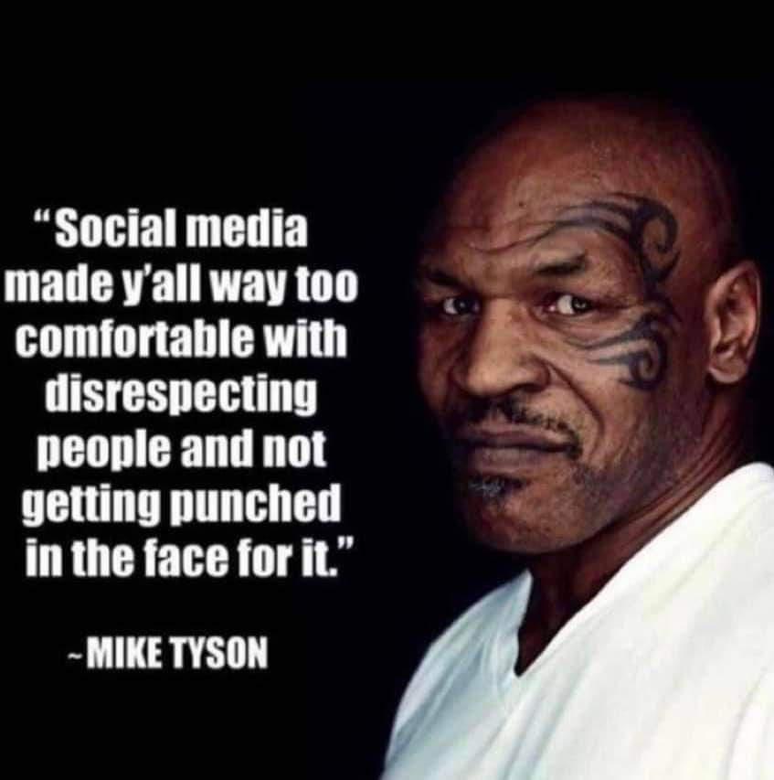 A close-up image of Mike Tyson looking intensely at the camera, with a tattoo visible on his left cheek. White text overlaid…