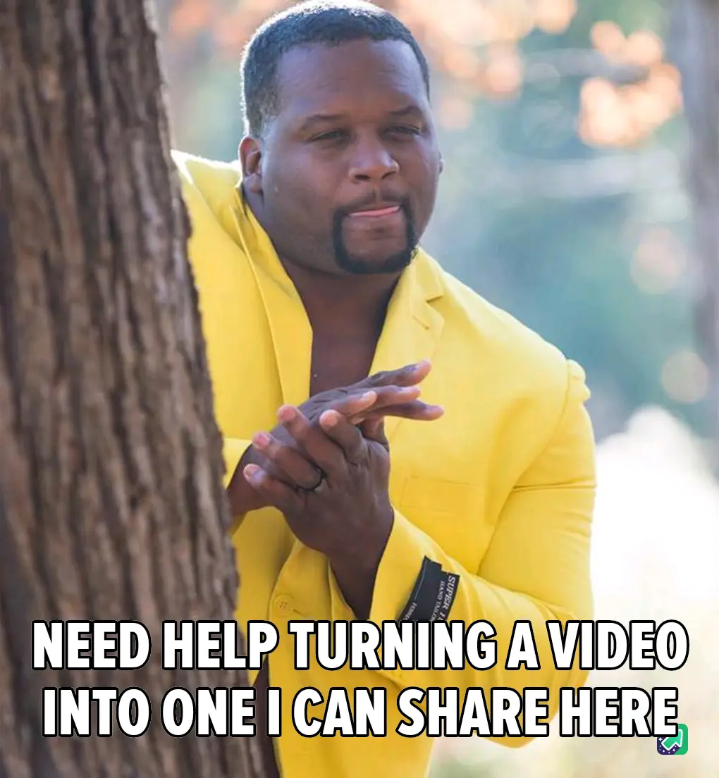 A man in a bright yellow suit peeks from behind a tree trunk with a hopeful, slightly pleading expression, his hands clasped…